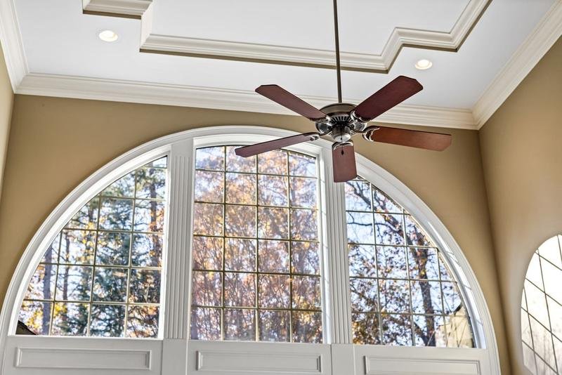Ceiling fan installed in a bright, airy room